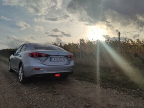 Mazda 3 sedan, Revolution - 5