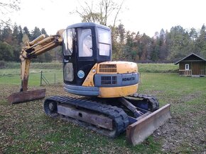 Minibager bager Komatsu PC 75 7.5T - 5