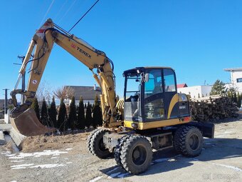 Otočný kolesový báger TEREX tw85 - 5