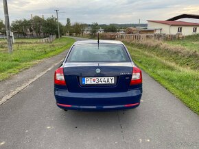 Skoda octavia 2 lift 1.6 tdi 77kw 2012 - 5