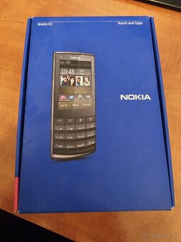 Tlacidlovy telefon Nokia X3 - 5