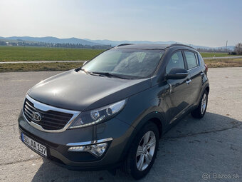 Kia Sportage 1.6 benzin dream edition r.v 2013 top stav - 6