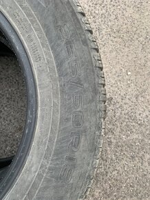 265/60R18 - 6