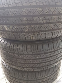 Kia Sportage 235/60 R16 - 6