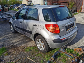 rozpredam suzuki grand vitara 1,9 ddis 95kw 2006 suzuki swif - 6