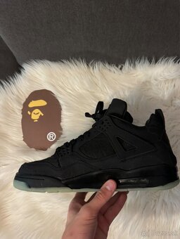 Jordan 4 black kaws - 6