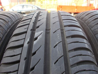 Plechové disky Ford + 185/65R14 - 6