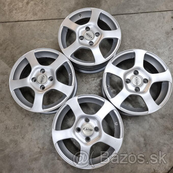 ALU Disky 4x100 R14 ET38 - 6