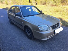 Hyundai accent  1.4. 61 kw  160 tis Najazdené - 6