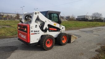 Šmykový nakladač Bobcat S650. - 6