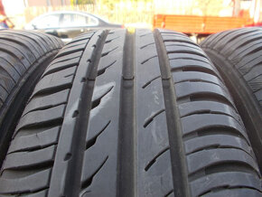 Plechové disky Ford + 185/65R14 - 6