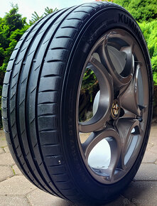 alu R17 4x100, orig. Alfa Romeo MITO, pneu 215/45 - 6