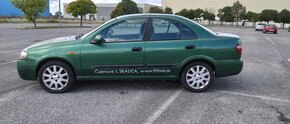 Nissan Almera N16 1,5i - 6