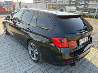 BMW Rad 3 Touring 330d - 6