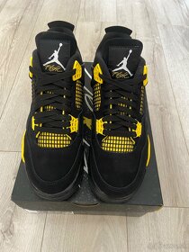 Jordan 4 Retro Thunder - 6