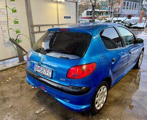 Peugeot 206 1,4 55kw 2006 - 6