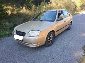 Hyundai accent 1,4 2004 - 7