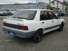 Peugeot 309 1,4i - 7