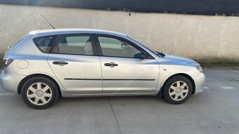 Predám mazda 3 1.4 benzín 62kw r.v2006 - 7