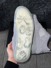 Air Jordan 4 KAWS - 7