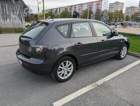 Mazda 3 1,6 77kW - 7