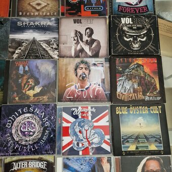 CD-čka...AXEL RUDY PELL,JUDAS PRIEST,DEEP PURPLE,AC/DC,QUEEN - 7