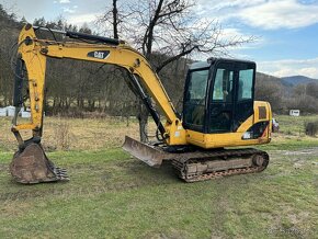 Minibager Caterpillar CAT 306 - 7