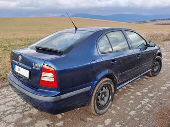 Škoda Octavia 1.4 benzín Tour - 7