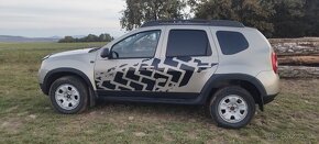 Dacia Duster 1.6 benzín LPG 4x4 REZERVOVANE - 7