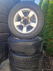 Suzuki Jimny 205/70R15 zimne - 7