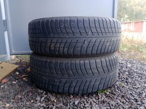 Celoročné pneu Bridgesone LM001 -215/60 r16 99H - 2ks- 6mm - 7