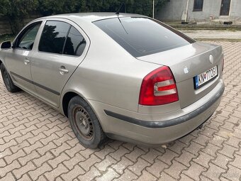 Octavia II , 1,9 TDi , 77kw motor bxe - 7