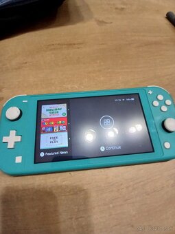 Nintendo switch lite+128gb SDkarta - 7