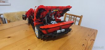 Ferarri daytona sp3, land rover defender, formula 1 mclaren - 7