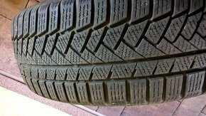 4 ks ZIMNÉ 215/65 R17 99H CONTINENTAL  cca 5-6 mm   DOT 4218 - 7