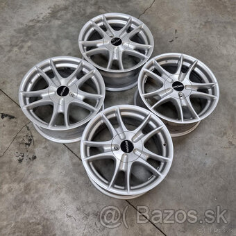 ALU Disky 4x100 R16 ET35 - 7