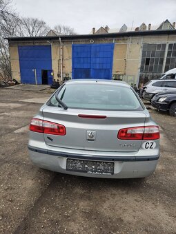 Renault laguna.        2004      1.9dci - 7