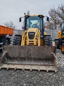 Komatsu WB 97S5 - 7