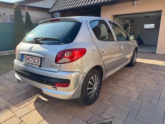 Peugeot 206+, 1.4i - 7