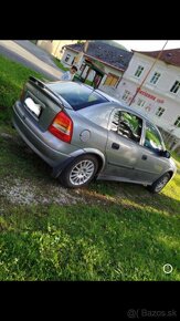 Opel astra G - 7