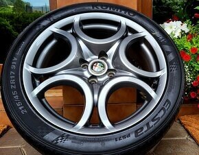 alu R17 4x100, orig. Alfa Romeo MITO, pneu 215/45 - 7