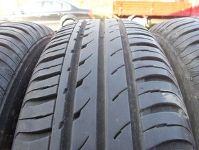 Plechové disky Ford + 185/65R14 - 8