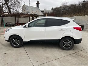 Hyundai Tucson ix35 ,1.6 - 8