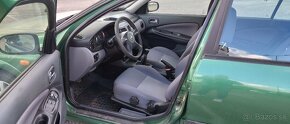 Nissan Almera N16 1,5i - 8