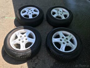 Alu kola Nissan Almera Tino 195/65 R15 - 8