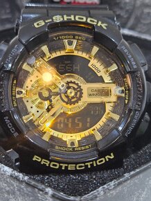 G SHOCK CASIO GOLD/BLACK - 8