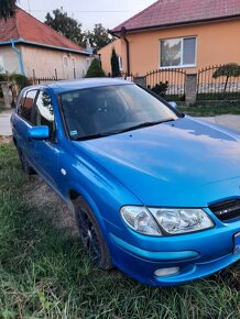 Nissan almera n16 1.5 - 8