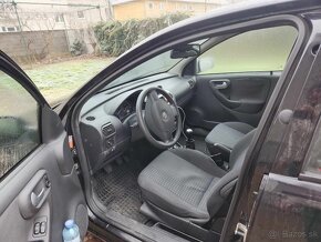 Opel Corsa 1.3cdti 2004 - 8