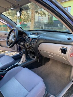 Nissan almera 1.5 - 8