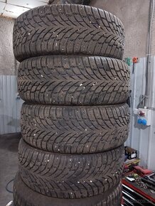 235/55R18 - 9